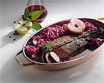 Saddle of venison with red cabbage and apples