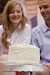 Coconut cake for the 4th of July, couple in background (USA)