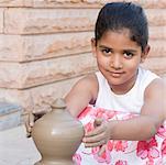 Portrait of a girl making a pottery