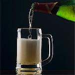 Beer being poured into a beer glass