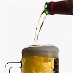 Close-up of beer being poured into a beer glass