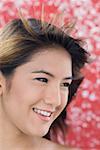 Close-up of a young woman smiling