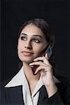 Close-up of a businesswoman talking on a mobile phone