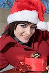 Portrait of Woman With Christmas Gifts, Rome, Italy