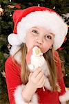 Portrait of Girl with Santa Claus Lollipop