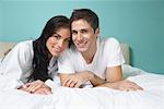 Portrait of Couple on Bed