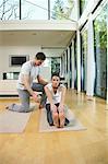 Couple Exercising in Home