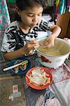 Girl Cleaning Bird Nests, Jakarta, Java, Indonesia