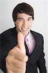 Businessman Giving Thumbs Up