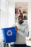 Businessman with Recycling Bin