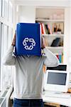 Businessman with Recycling Bin over Head