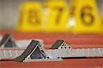 Track and field starting blocks at starting line