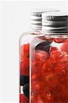 Fresh fruit in cosmetic bottles