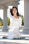 a Chinese young woman doing yoga