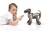 Boy Feeding Robot Dog
