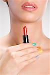 Woman Holding Lipstick