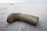 Rubber Boot Washed Up on Beach, St Peter-Ording, Nordfriesland, Schleswig-Holstein, Germany