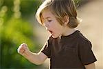 Boy Looking at Bug, Costa Mesa, Newport Beach, Orange County, California, USA