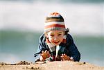 Child Playing on the Beach, Huntington Beach, Orange County, California, USA