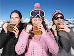 Young women having drink at mountains