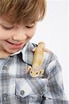 Boy with Lizard on Shoulder