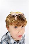 Boy with Lizard on Head