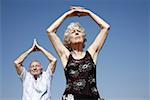 Senior couple stretching