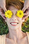 Flowers Covering Woman's Eyes