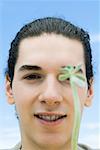 Young man with succulent plant