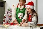 Mother and Daughter Making Christmas Cookies