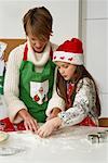 Mother and Daughter Making Christmas Cookies