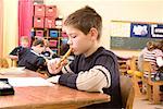 Boy in Classroom Doing Work