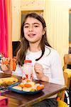 Children in Classroom Eating Snacks