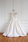 Wedding Dress Hanging on Closet Door