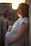 Portrait of Pregnant Woman at Sunrise