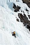 Ice Climber on Frozen Waterfall, Near Jasper, Alberta, Canada