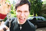 A punky male and his car keys