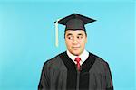 Portrait of man in cap and gown