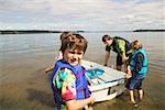 Father and kids going boating