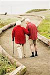 An elderly couple out for a walk