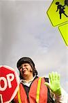 A female crossing guard at work