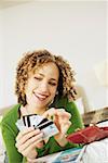 Woman on phone with credit cards