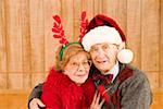 Portrait of elderly couple at Christmastime