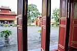 Wooden doors to courtyard at Vietnamese citadel