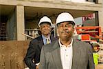 Portrait of businessmen at construction site