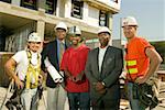 Group portrait of men at construction site