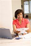 Woman sorting through mail