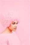 Studio shot of woman wearing pink wig