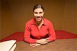 Portrait of businesswoman at desk