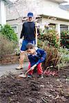 Father and son gardening